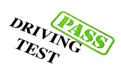 a green stamp that says pass driving test with the word passed in black ink on a white background