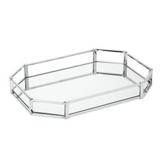 a glass tray with silver trimmings on the bottom and sides, sitting on a white surface