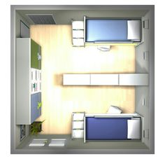 an overhead view of a room with two beds and a desk in the corner,