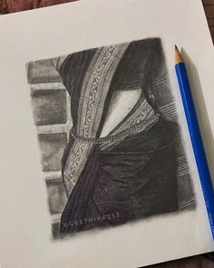 a pencil drawing of a woman's head with a shawl draped over her shoulders