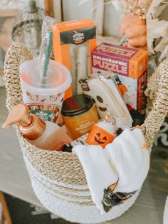 a basket filled with lots of items sitting on top of a table