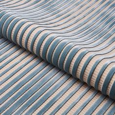 a blue and beige striped fabric