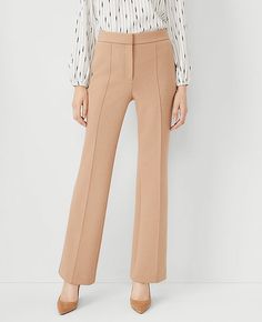 Elevate your wardrobe with the Ann Taylor Pintucked Trouser Pant in Double Knit, a testament to sophistication and comfort. These trousers are meticulously tailored to enhance your silhouette, featuring front pintucks that streamline the fit and a subtle flare that elongates the legs.

- Size: 0
- Color: Natural Camel
- Gender: Female
- Material: 78% Polyester, 15% Viscose, 7% Spandex; Lining: 100% Polyester
- Fit: Regular fit, lean through the hip and thigh
- Rise: High rise, sits 1/2" to 1" be Camel Pants, Khaki Slacks, Knitted Suit, Professional Attire, Double Knit, High Waisted Trousers, Double Knitting, Straight Pants, Trouser Pants