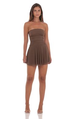 Designed in Los Angeles- Mini Length- Pull-on - Fully lined- Sheer- Made in mesh fabric- Hand wash coldModel is wearing a size small that measures 23in/58cm in lengthSlight modifications might be made to improve garment quality.Handling the garments with care, hand-washing and air-drying is strongly recommended. Brown Hoco Dress, Brown Homecoming Dresses, Short Brown Dress, Black Cowgirl Boots, Sky Brown, Bra Tank Top, Bra Tank, Casual Day Dresses, Sorority Outfits