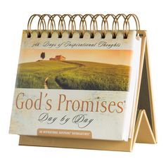 a desk calendar with the words god's promises day of day written on it