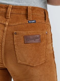 Your favorite flare is back, but now in the perfect texture for the season ahead. Our Women’s Wrangler Retro® Bailey High Rise Corduroy Trouser Jean comes with all the same iconic details, including our signature five-pocket styling, the “W” stitching, and a logo patch. That ultra-soft corduroy is crafted from a cozy cotton blend with just the perfect amount of stretch. Best of all, these trousers feature a flattering high-rise silhouette that hugs you in all the right places. Fit: Regular Rise: High Front Rise: 10 5/8" Leg: Trouser Leg Opening: 21 5/8" Front Closure: Zip-Fly with button closure Long Sleeve Kids, Boys Bottoms, Boys Pajamas, Wrangler Jeans, Sweater Set, Corduroy Pants, Trouser Jeans, Girls Jeans, A Logo