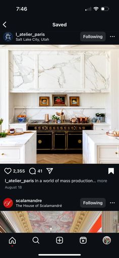 an image of a kitchen with white cabinets and marble counter tops on the phone screen