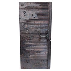 an old wooden door with rivets on the front and side, isolated against a white background