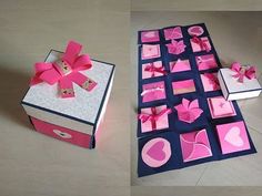 pink and white boxes with bows and hearts cut out of them sitting on the floor