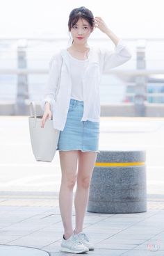 IU's basic white shirt open over a white t-shirt and pale denim skirt is perfect inspiration for a day out this spring! Korean Airport Fashion, Clothes Hacks, Denim Shorts Outfit, Trendy Skirts, Iu Fashion, Korean Fashion Trends, Korea Fashion, Korean Outfits, Kpop Fashion