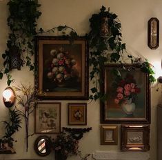 there are many pictures on the wall with flowers and plants in them, including roses