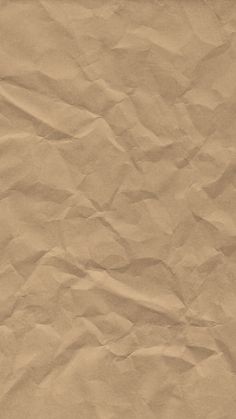 a piece of brown paper that has been wrinkled