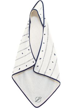 a white and blue bandana with black dots on it