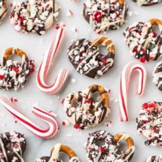 some type of doughnuts with candy canes on them and letters that spell out the word love