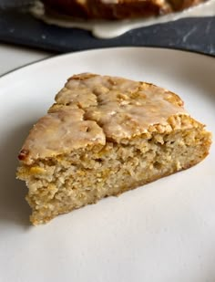 a piece of cake sitting on top of a white plate