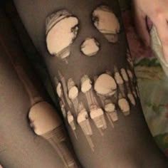 the legs are decorated with white frosting on them