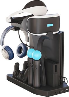 a black and white robot with headphones attached to it's earpieces