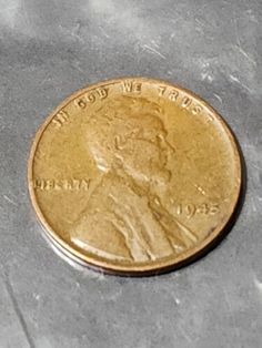 a penny sitting on top of a table