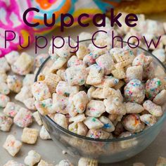 a glass bowl filled with sprinkles next to a pile of other treats