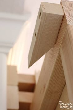 a close up of a wooden structure made out of wood