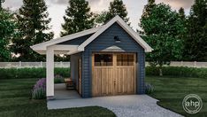 a small blue shed sitting in the middle of a yard