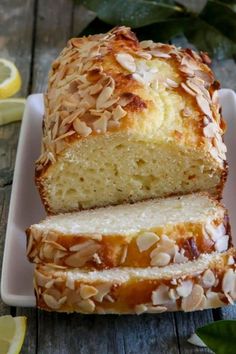 a loaf of lemon almond bread on a plate