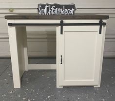 a white desk with a sign that says smith harbor on it's top and bottom