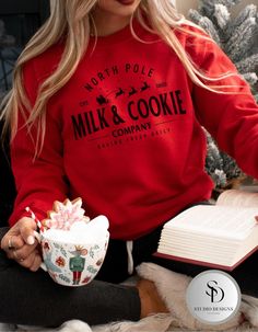 Snuggle up this holiday season with the cozy and festive Milk and Cookie Company crewneck sweatshirt. Featuring a vintage-inspired design, this sweatshirt is perfect for spreading Christmas cheer and enjoying the warmth of the season. Made from a soft, high-quality Gildan fabric, this crewneck offers both comfort and style, whether you're lounging by the fireplace or baking cookies. Ideal for gifting or adding to your holiday wardrobe, this sweatshirt brings a touch of nostalgia with its charming design. Material: Gildan cotton blend for ultimate comfort Fit: Unisex sizing, relaxed fit for a cozy feel Design: Milk & Cookie Company  Occasions: Perfect for casual outings, baking cookies, or as a thoughtful Christmas gift Gift Ideas: Ideal for baking cookies, casual outings, or those looking Christmas Sweatshirts Vinyl, Christmas Sweatshirt Ideas, Vintage Christmas Shirt, Cookie Company, Cricut Christmas, Thoughtful Christmas Gifts, Baking Cookies, Christmas Crewneck, Milk Cookies