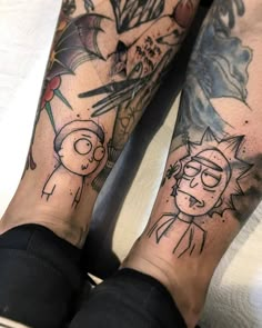 two people with matching tattoos on their legs