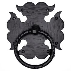 a black door handle with an ornate design on the front and back of it's face