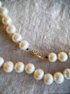 *Classic, Knotted Pearl Necklace *14k Gold clasp *Pearl *Genuine, Freshwater cultured *18 inches, 8mm pearls *Circa 1990s ☞ Some fine jewelry items may show patina or signs of age or wear in photos. Rest assured, your jewelry will be carefully cleaned and polished prior to shipping! If you would like the natural patina left on, send us a note! Quality You Can Trust *Authenticated by a GIA Graduate Gemologist  *Detailed Quality Control and Careful Restoration *5 Star Customer Service. Questions? Send us a message! Timely Processing *Fast & Free Shipping! *Professional Ring Sizing in only 5-10 business days *Personalized Delivery for Gifts or Special Occasions Happiness, Guaranteed * 30 Day Returns and Exchanges More Vintage Jewelry ☞ JewelryOnRepeat.Etsy.com ↓ Additional Item Details ↓ Neck Vintage Pearls Aesthetic, Pearls Aesthetic, Vintage Pearl Necklace, Vintage Designer Jewelry, Pearl Necklace Vintage, Detailed Necklace, Vintage Pearl, The 1990s, I Love Jewelry