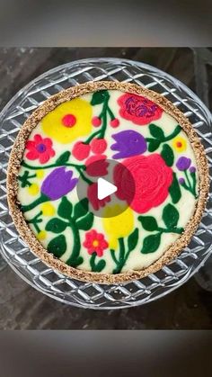 a pie with flowers painted on it