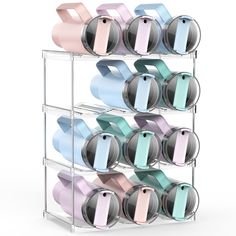 a rack with many different colored pots and pans