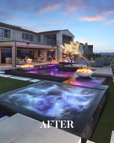 an outdoor pool with water features in front of a large house at dusk, and the words after above it