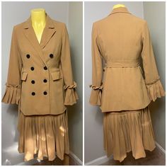 This 2 Piece Set Is Unique! One Of A Kind, Camel Blazer And Dress Set. The Dress Is A Camel Body Con With A Drop Waist Ruffle Skirt. The Blazer Is A Military Jacket With Double Buttons And Ruffled Sleeves With A Belt. Sizing Is Medium/Large Double-breasted Skirt Suit For Fall Workwear, Fall Workwear Double-breasted Skirt Suit, Double-breasted Fall Skirt Suit For Work, Beige Skirt Suit For Spring Workwear, Fall Party Skirt Suit, Cream Skirt Suit For Spring Workwear, Beige Fall Skirt Suit, Semi-formal Beige Outerwear For Spring, Beige Semi-formal Outerwear For Spring