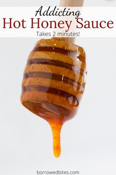 a honey dripping from a wooden spoon with the words, adding hot honey sauce takes 2 minutes