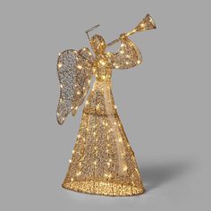 Glam up your house for the holidays with this Gold Mesh Fabric Trumpeting Angel LED Novelty Sculpture from Wondershop™. This novelty sculpture features a gold-mesh-fabric trumpeting angel to bring holiday cheer to your home. Plus, it’s embedded with 120 white constant lights for a radiant accent. Place this Christmas decoration in your patio or your living room to add a fun, festive vibe to your space. Wondershop™: Welcome to the Wondershop. Incandescent Christmas Lights, Tree Collar Christmas, Light Up Christmas Decorations, Plush Christmas Ornaments, Orange String Lights, Target Decor, Mini String Lights, Grey Christmas, Gold Christmas Decorations