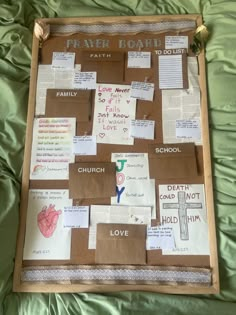 a bulletin board is covered with paper and other things to write on it as if they were made out of cardboard