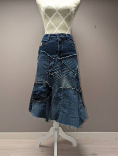 "Upcycled denim patchwork skirt with frayed seams and jagged hem. Hand painted patch detail. Waist measures 29\" and length is approximately 25\"." Denim Patchwork Dress, Denim Patchwork Jacket, Patchwork Denim Skirt, Denim Tank, Denim Skirt Outfits, African Fashion Modern, Womens Skirts, Patchwork Skirt, Bleached Denim