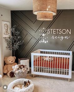 a baby's room with a crib and teddy bears