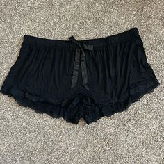 Nwt Torrid Black Super Soft Lace Trim Short Size 6x (30) Lace Hem Adjustable Drawstring Waist Super Soft Sleep Short Wash Cold; Line Dry Approx. Measurements (Flat): Waist: 24 1/2" Rise: 14 1/2" Inseam: 2" Length: 14" Materials: 95% Rayon/5% Spandex Smoke/Pet Free Home Short Sleep Shorts, Goth Pajamas Aesthetic, Alternative Pajamas, Black Sleep Shorts, Sleep Wear Aesthetic, Goth Pjs, Gothic Pajamas, Gift Desserts, Black Pajama Shorts