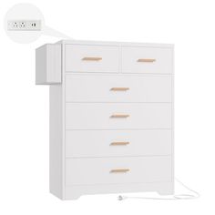 an image of a white dresser with wooden drawers and power strip plugged into the wall