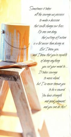 a cup sitting on top of a wooden stool next to a poem written in cursive writing