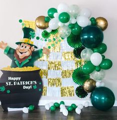 a st patrick's day party with balloons and decorations