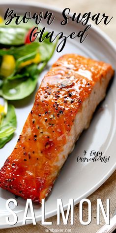 salmon on a white plate next to a salad and the words brown sugar glazed salmon