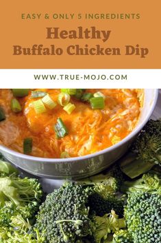 healthy buffalo dip with broccoli and green onions in a white bowl on a table