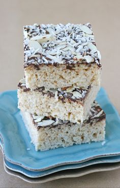 three pieces of cake sitting on top of a blue plate