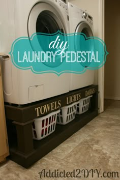 a washer and dryer sitting on top of each other in a laundry room