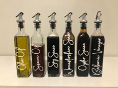 six bottles with different types of wine in them