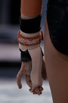 a person's feet and leg with an ankle brace attached to them